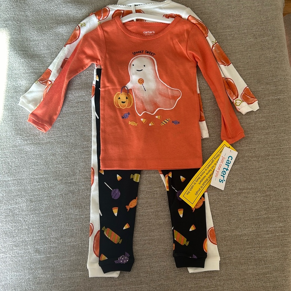 Carters 2 pair of pajamas Halloween and Pumpkins. Size various. NWT.